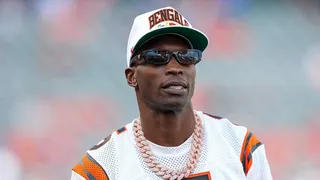 Chad Ochocinco Johnson looks on before an NFL game at Paycor Stadium.
