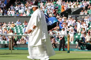 Naomi Osaka walks out at Wimbledon wearing a Japanese kimono