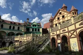 An unfinished castle-style building stands at a deserted Evergrande Group resort development in Guiyang, Guizhou province.