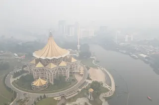 An aerial view shows haze shrouding the area around the Sarawak Legislative Assembly building in Kuching, the capital city of Sarawak state on the island of Borneo on Sept 1. Air quality in Malaysia’s Sarawak state deteriorated further on Sept 1 as smoke from Indonesian forest fires drove up respiratory complaints and sent residents scrambling for protective masks. AFP PIC