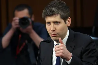 Image may contain Sam Altman Body Part Finger Hand Person Adult Face Head Photography Portrait and Accessories