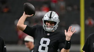 Kirk Cousins warms up before a preseason game in Las Vegas.