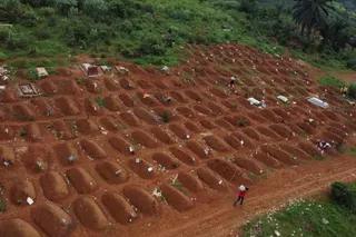 A drone view of workers at the Ceca-20 cemetery, as aid agencies intensify efforts to contain the Ebola outbreak in the Democratic Republic of Congo