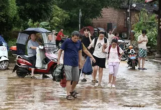 福建莆田市因连日出现强降雨而成为重灾区。（图取自新华社）