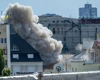 A thick plume of smoke rises in Kyiv