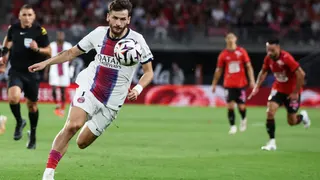 PSG's Georgian forward #07 Khvicha Kvaratskhelia eyes the ball during the French L1 football match between Stade Rennais FC and Paris Saint-Germain (PSG) at the Roazhon Park stadium in Rennes, western France on August 23, 2026.