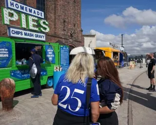 Fans outside Everton’s Hill Dickinson Stadium