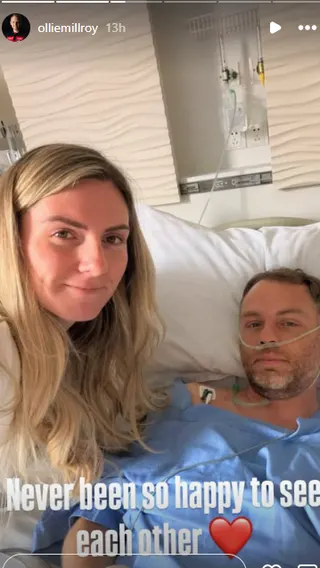 Ollie Millroy in a hospital bed with wife Fern pictured beside him